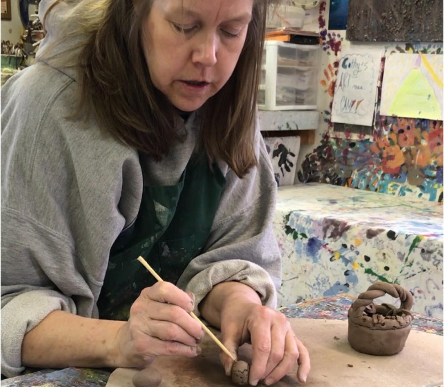 cathy teaching clay