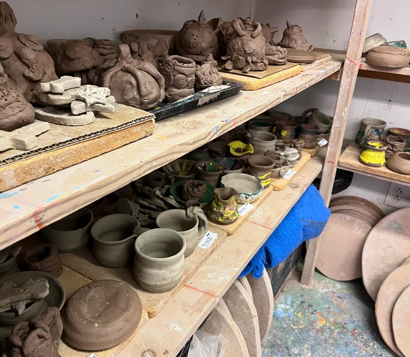 clay work in progress on shelves